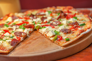 Image showing Food, cheese and pizza on table in restaurant with mozzarella, salami and herbs. Cooking, kitchen and fresh margherita, bread and delicious gourmet pie, dish or fastfood meal from small business.