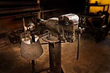 Image showing Vice, metal shop and warehouse with steel tools, manufacturing and blacksmith store. Workspace, factory tool and industry equipment with no people for welder craft and artisan worker workshop