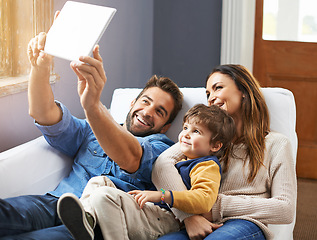 Image showing Smile. Selfie, tablet and happy family on video call in a home together using social media on the internet or online. App, website and parents with kid or child in happiness and smile for a picture.