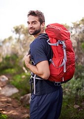 Image showing Hiking, walking and portrait of man on mountain for fitness, adventure and travel journey. Backpack, summer and workout with male hiker trekking in nature path for training, freedom and explore
