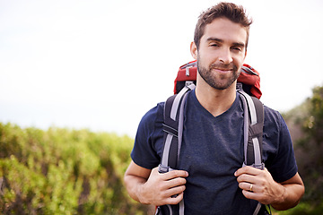 Image showing Hiking, nature and portrait of man on mountain for fitness, adventure and travel journey. Backpack, summer and workout with face of male hiker trekking on path for training with mockup space