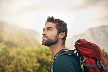 Image showing Hiking, relax and thinking with man on mountain for fitness, adventure and travel journey. Backpack, summer and workout with male hiker trekking in nature path for training, freedom and explore