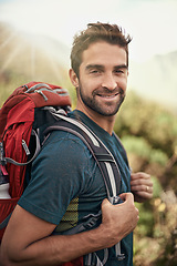 Image showing Hiking, fitness and portrait of man on mountain for peace, adventure and travel journey. Backpacking, summer and workout with male hiker trekking in nature path for training, freedom and explore