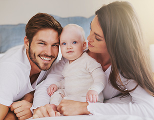 Image showing Happy father, mother and baby for love, care and quality time to relax together in family home. Mom, dad and parents with cute infant kid for happiness, support and newborn development