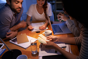 Image showing Teamwork, night and a business group working in the boardroom for planning, strategy or innovation. Meeting, collaboration and overtime with a team of employees at work for design in the evening