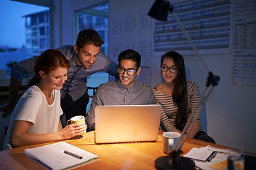 Image showing Collaboration, night and an employee team on a laptop, working in the boardroom for planning, strategy or innovation. Meeting, teamwork and overtime with a business group at work in the evening