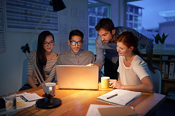 Image showing Meeting, night and a business team on a laptop, working in the boardroom for planning, strategy or innovation. Collaboration, teamwork and overtime with a group of employees at work in the evening