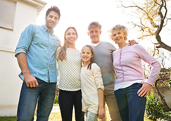 Image showing Hug, backyard portrait and happy family grandparents, parents and kid bonding, smile and spending outdoor time together. Wellness, solidarity and reunion people enjoy spring sunshine, nature and love