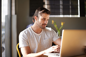 Image showing Entrepreneur, laptop or man in coffee shop reading news online the stock market for trading report update. Cafe, remote work or trader typing an email or networking on internet or digital website