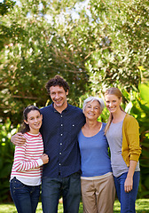 Image showing Family are happy in portrait, parents with kid and grandmother, happiness outdoor in nature park together. Love, trust and support with people spending quality time with care and generations