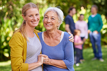 Image showing Senior mom, woman and hug in garden with happiness, love and care in portrait by trees on holiday. Elderly mama, lady and embrace with bond, excited face and family in backyard with summer sunshine