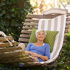 Image showing Elderly, woman and sleep on hammock during retirement and relax on summer vacation with happiness. Garden, senior person nap and rest with smile during spring while happy and at peace in nature