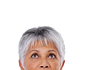 Image showing Senior woman, looking up and thinking on question or isolated, curious and face and studio white background. Elderly lady, dreaming of future or wondering, idea and thoughtful expression closeup