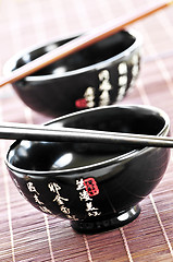 Image showing Rice bowls and chopsticks