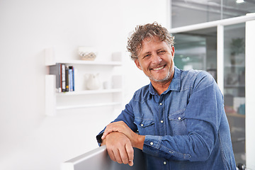 Image showing Portrait, smile and business man in office with pride for career or creative job. Entrepreneur, professional and male designer, confident boss and mature person from Australia leaning on computer.