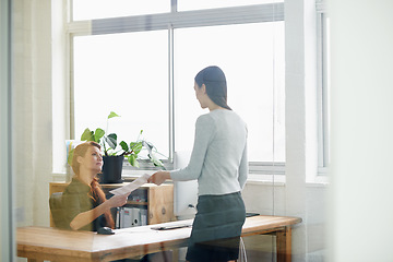 Image showing Documents, resignation letter and business women in office for quitting, termination and unemployment note. Corporate, discussion and female worker giving manager paperwork to resign in workplace