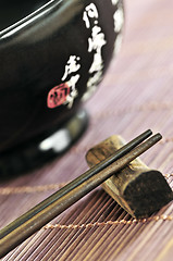 Image showing Rice bowl and chopsticks