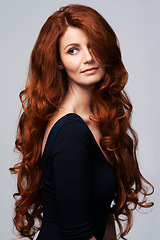 Image showing Red hair, beauty and ginger woman in studio for keratin treatment, wellness and haircare on white background. Salon, hairdresser and female model thinking with shine, healthy and natural hairstyle