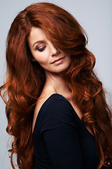 Image showing Red head, hair and woman in studio with beauty for keratin treatment, wellness and haircare on white background. Salon, hairdresser and female model with texture shine, healthy and natural hairstyle