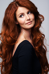 Image showing Red hair, beauty and face of woman in studio for keratin treatment, wellness and haircare on white background. Salon, hairdresser and ginger female model with shine, healthy and natural hairstyle