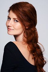 Image showing Ginger, hairstyle and portrait of woman in studio for salon, hair care and cosmetology. Smile, red head and stylist with female model isolated on white background for haircut, makeup and cosmetics