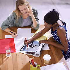 Image showing Women in team strategy meeting at fashion magazine agency, conference room and collaboration. Diversity, top view and creative female employees working together, editorial ideas and brainstorming