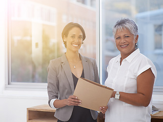 Image showing Women, business team and portrait in office for success, teamwork or collaboration. Corporate team or manager and employee together for planning, management or partnership with paperwork for report