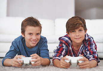 Image showing Boys playing video game, friends and gaming at home in smile portrait for fun together in living room. Gamer kids play games on console, youth and happy male children with esports and controller