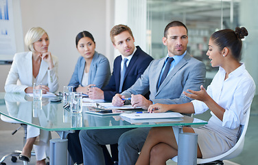 Image showing Business people in a meeting, collaboration and planning in conference room with diversity in corporate group. Men, women and female team leader with conversation, project strategy and teamwork