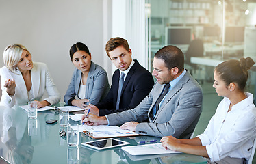 Image showing Corporate group in business meeting, team discussion in conference room with diversity in workplace. Men, women and professional planning with conversation, collaboration and analytics paperwork