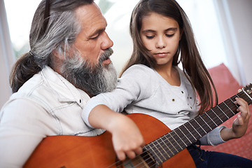 Image showing Music, guitar and grandfather teaching girl to play, help with creativity, learning and creative development. Musician, senior man helping female kid learn focus and skill on musical instrument