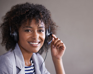 Image showing Portrait, call center and African woman with headset and happy virtual communication, technical support or online chat. Professional agent, consultant or face of business person in telemarketing job