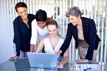 Image showing Corporate, collaboration and women with a laptop, teamwork and share ideas at the workplace. Female professionals, employees and workers with happiness, staff and technology for startup development