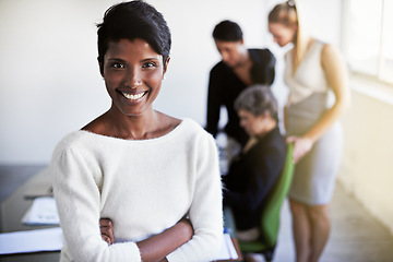 Image showing Smile, leadership and portrait of a businesswoman in a meeting in a modern corporate office. Happy, success and professional Indian female manager standing with crossed arms in workplace boardroom.