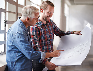 Image showing Contractors, project and men with a blueprint, planning and brainstorming for a new project, talking and engineers. Male client, handyman and employees with a document architecture and discussion