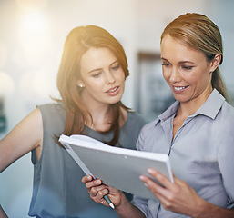 Image showing Collaboration, notebook and planning with a business team doing research together in an office at work. Teamwork, strategy or corporate partnership with women employees or colleagues working on paper