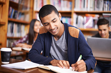 Image showing Study, writing and smile with man in library for education, research and classroom quiz. Focus, learning and notebook with male student on university campus for knowledge, scholarship and project