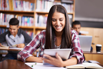 Image showing University, tablet and woman in school library for online research, studying and learning. Education, college academy and happy female student on digital tech for knowledge, internet and website