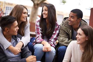 Image showing University, community and people chat on campus in conversation, talking and laughing outdoors. Diversity, education and happy men and women students smile for learning at school, academy and college