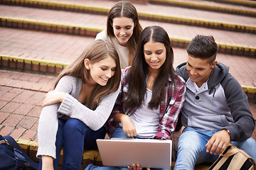 Image showing University, education and friends on laptop on campus in conversation, learning and discussion for school. Diversity, college and man and women students on computer for class, study and group project