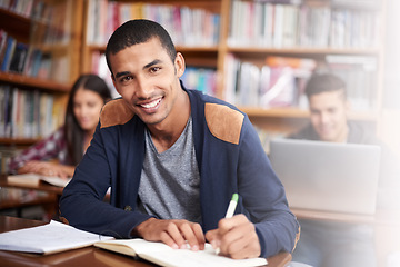 Image showing Study, writing and library with portrait of man for education, research and classroom quiz. Smile, learning and notebook with male student on university campus for knowledge, scholarship and project