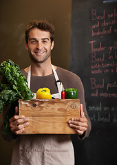 Image showing Chef, vegetable crate and portrait of man in restaurant with vegetables for vegetarian or vegan ingredients. Smile, male cook with box and food from Canada for cooking in kitchen or small business.