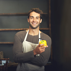 Image showing Chef, bell pepper and portrait of man in kitchen with vegetables for vegetarian, healthy diet or vegan ingredients. Smile, male cook holding capsicum and food from Norway for cooking in restaurant.