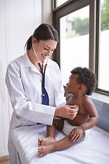 Image showing Stethoscope, exam and baby with woman doctor at hospital for heart, lung or chest checkup. Medical, consultation and lady pediatrician for toddler healthcare or child development, health or heartbeat