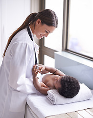 Image showing Doctor woman with baby boy, healthcare and pediatrician consultation with health insurance and pediatric medicine. Female physician with smile, African and male toddler in medical checkup at clinic