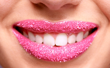 Image showing Happy woman lips, pink lipstick and sugar scrub closeup, makeup and beauty with exfoliation and sparkle. Bright aesthetic, female model mouth and cosmetics product, cosmetology with cosmetic lip care