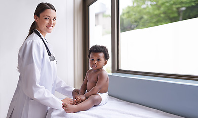 Image showing Doctor woman with baby boy, pediatrics and health with early childhood development and growth. Female pediatrician portrait, African male toddler with medical checkup at clinic or hospital