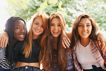 Image showing Girl friends, happy hug and portrait outdoor with diversity in group on holiday summer camp. Female student, sunshine and happiness face of young gen z and teen people together on vacation break