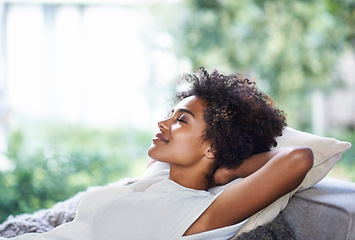 Image showing Relax, smile and black woman on sofa sleeping, afternoon nap and rest in calm apartment on weekend. Sleep, daydream ideas and girl on couch relaxing, self care and stress free chill time in lounge.