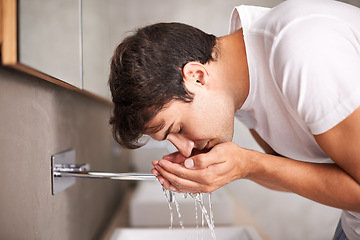 Image showing Water, washing face and man in bathroom for wellness, facial cleaning and morning grooming. Skincare, beauty and male person at home for hygiene, hydration or cleansing for self care, health and skin